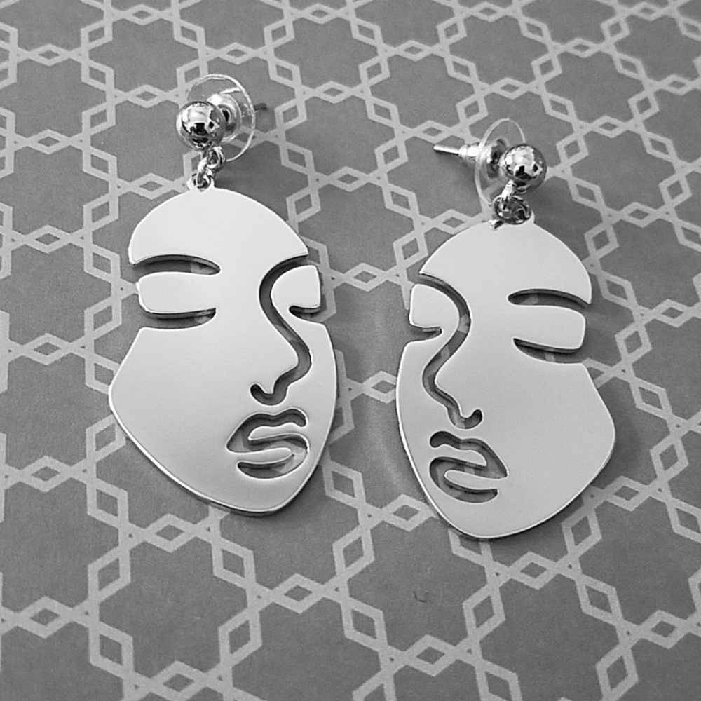 Abstract metal face earrings